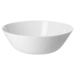IKEA bowl made from durable tempered glass, perfect for serving salads, pasta, or side dishes.